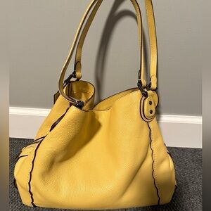 Like new Coach yellow purse.